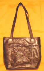 woman leather bag by art export bali indonesia