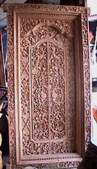building a home, wood doors, art, bali indonesia