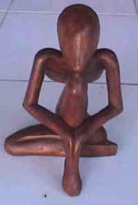 human wood sculpture bali indonesia